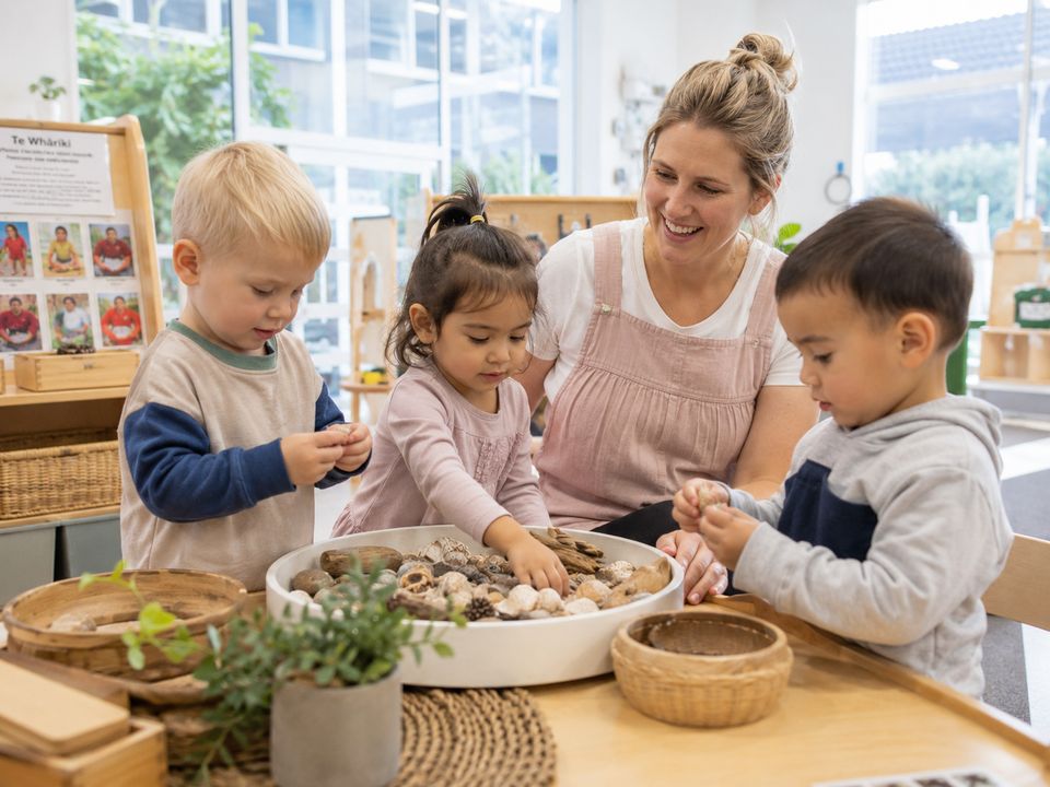 Teacher supporting children in a small group learning moment
